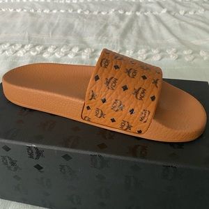 Brand new MCM slides, size 8, with box